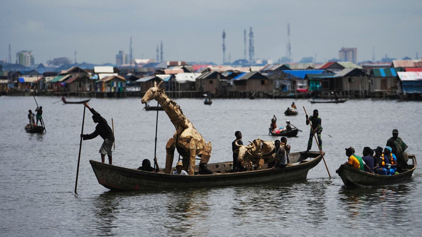 In Nigeria’s floating slum, ‘The Herds’ tour spotlights climate change where it’s felt the most – AP News