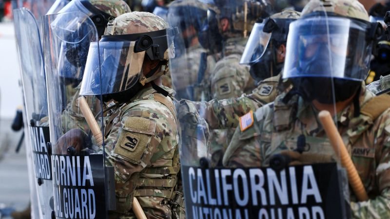 Live updates: Appeals court pauses ruling requiring Trump to return control of National Guard to California – CNN