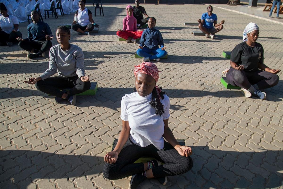 Yoga in a Zimbabwe tavern is the latest mental health outreach in a struggling country – Yahoo